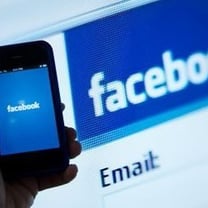 Facebook CEO says group will not become a media company